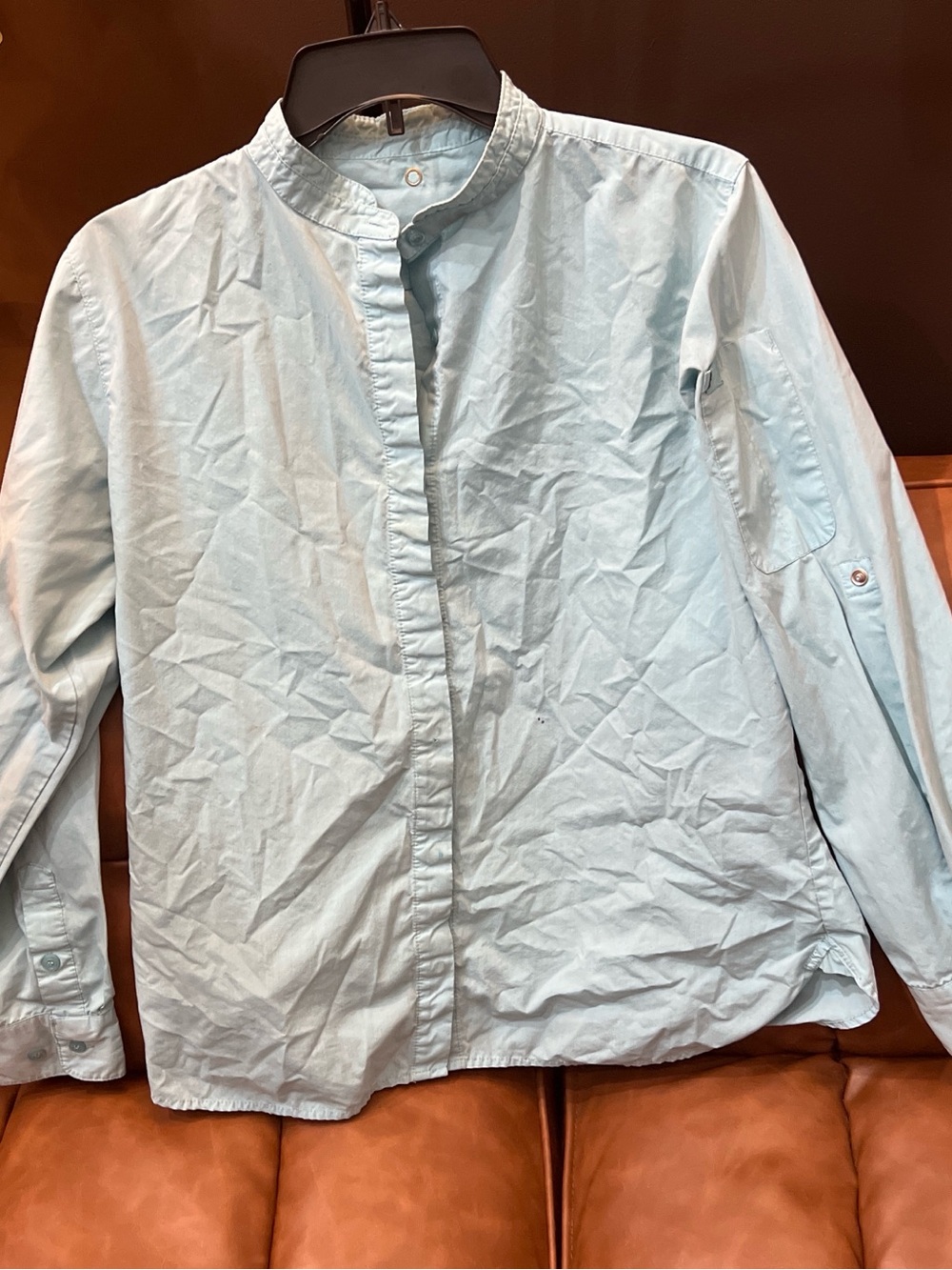 Light Blue Button-Up Shirt with Subtle Ink Marks